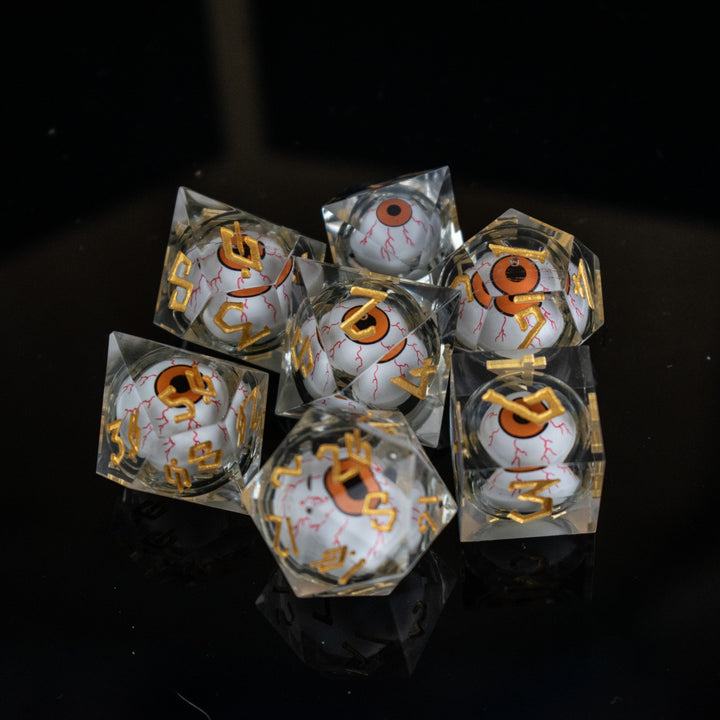 The Watcher: Orange-Eyed Liquid Core Dice Set